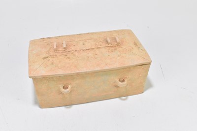 Lot 1007 - A Chinese Han dynasty (206BC-220AD) terracotta rectangular casket and cover