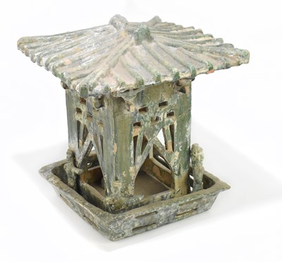 Lot 1015 - A Chinese Song dynasty (960-1279AD) green glazed model of a tower with four archers