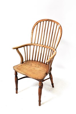 Lot 22 - A Georgian yew wood Windsor chair with comb...