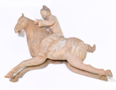 Lot 1027 - A Chinese Tang dynasty (618-906AD) model of a horse