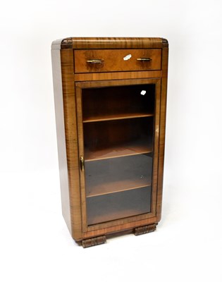 Lot 4 - A 1930s walnut display cabinet with single...