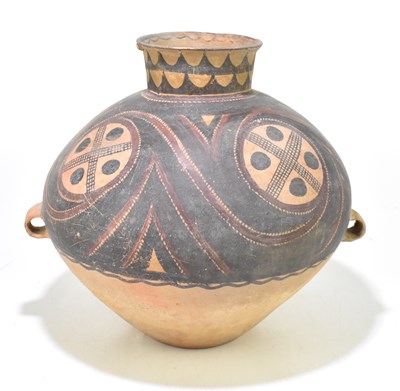 Lot 1014 - A Chinese Neolithic (circa second millennium BC) large terracotta vessel with twin lugged handles and painted detail