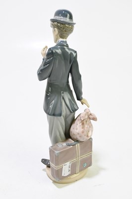 Lot 635 - LLADRO: a ceramic figure of Charlie Chaplin,...