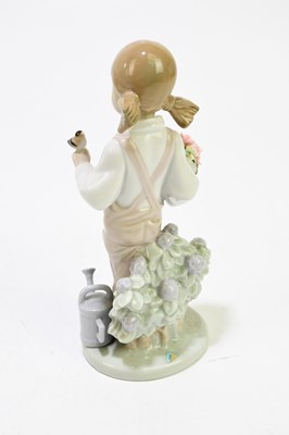 Lot 635 - LLADRO: a ceramic figure of Charlie Chaplin,...