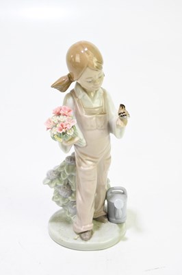 Lot 635 - LLADRO: a ceramic figure of Charlie Chaplin,...