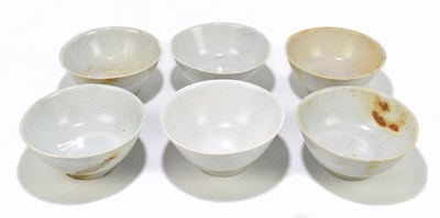 Lot 1031 - Six Chinese Tek Sing Cargo Celadon plain footed bowls