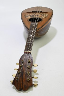 Lot 1039 - STRIDENTE; an Italian mandolin, length 54cm,...