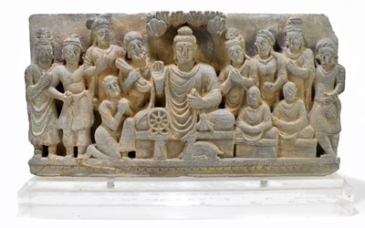 Lot 1022 - An early Sino-Tibetan carved stone panel