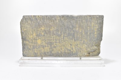 Lot 1022 - An early Sino-Tibetan carved stone panel