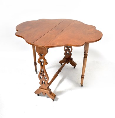 Lot 47 - A Victorian walnut Sutherland table with...