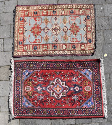 Lot 87 - Two small Middle Eastern rugs, both 93 x 62cm...