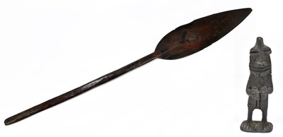 Lot 58 - A late 19th/early 20th century hardwood tribal paddle