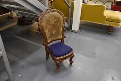 Lot 134 - An unusual Victorian correction type chair on...