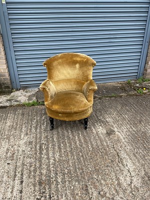 Lot 135 - A Victorian upholstered armchair on turned...