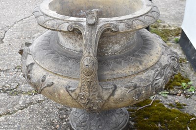 Lot 150 - A large stone garden urn decorated with...