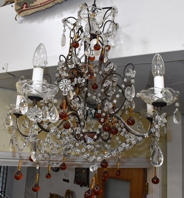 Lot 168 - A decorative wrought iron framed five branch...