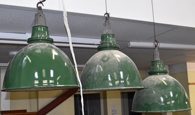 Lot 148 - Three large green industrial-style pendant...