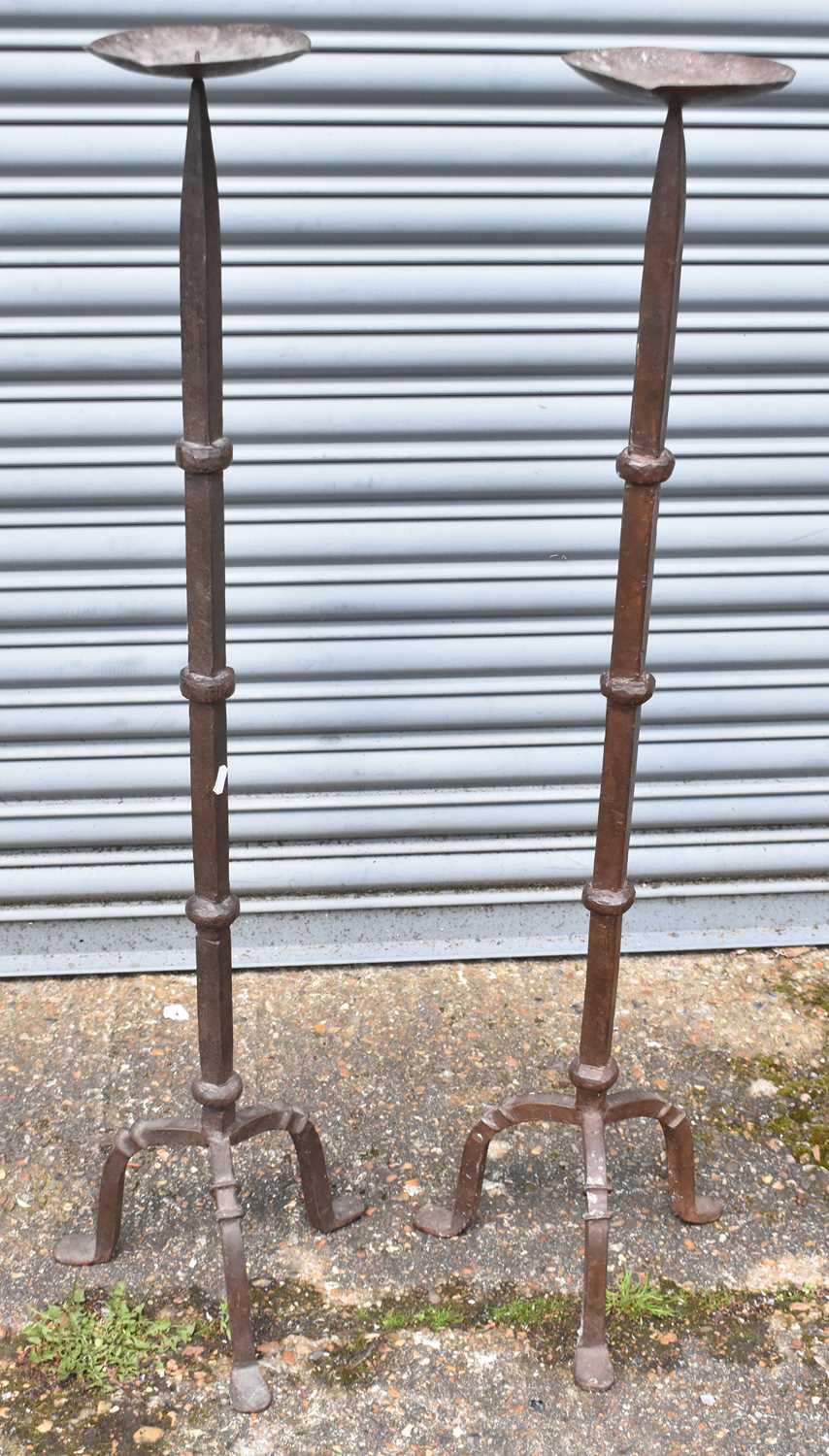 Lot 325 - A pair of large cast iron freestanding pricket...