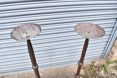 Lot 325 - A pair of large cast iron freestanding pricket...