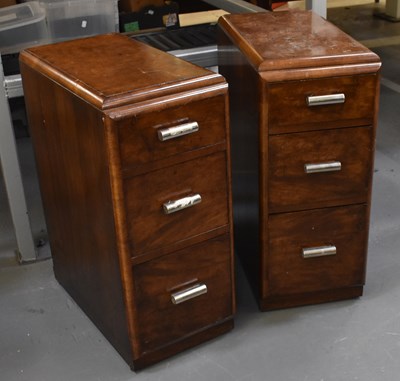 Lot 79 - A pair of Art Deco style walnut three drawer...