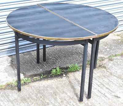 Lot 50 - A pair of retro ebonised and brass demi-lune...