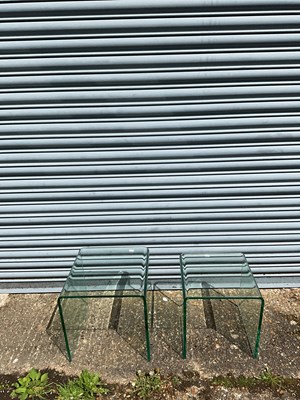 Lot 138 - Two modern curved glass occasional tables, the...