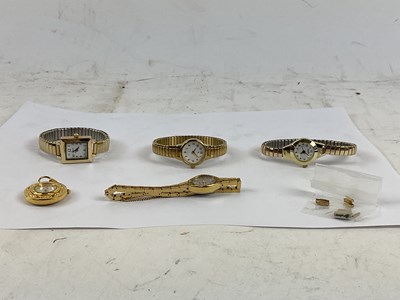 Lot 957 - A group of four lady's wristwatches, including...