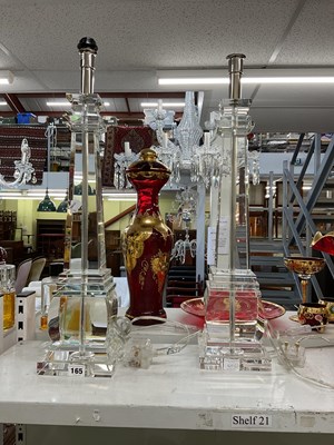 Lot 165 - A pair of glass column form table lamps,...