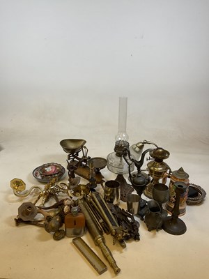 Lot 205 - A box of metal ware including oil lamps, hip...