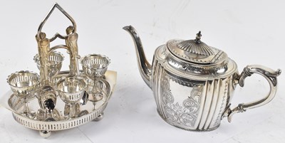Lot 741 - A late Victorian plated teapot with engraved...