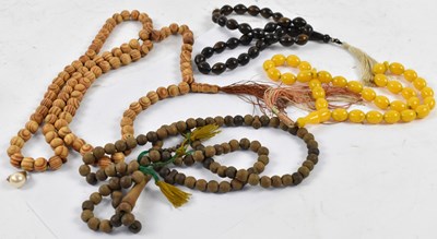 Lot 940 - Two wooden and two bead necklaces (4).