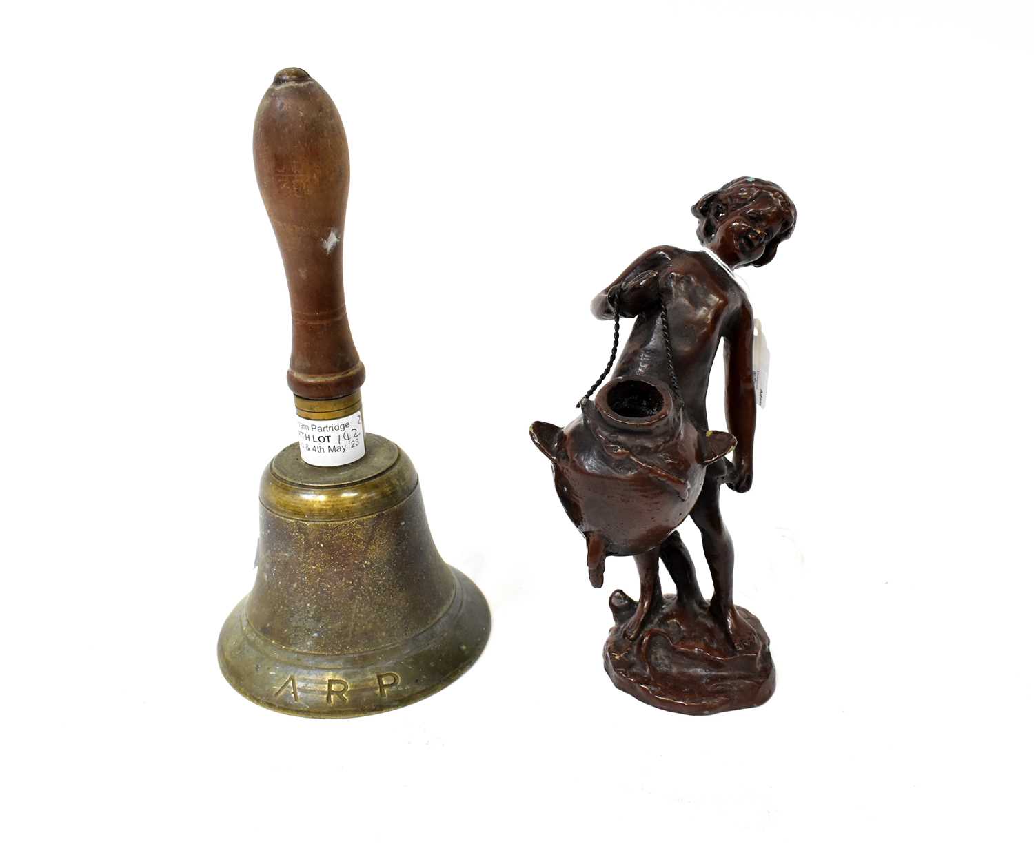 Lot 142 - An early 20th century brass bell, incised