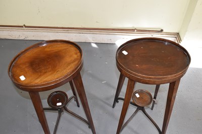 Lot 38 - A pair of Edwardian mahogany oval stands (part...