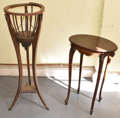 Lot 108 - A French style oval side table and a...