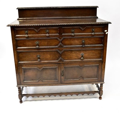 Lot 25 - A Jacobean-style oak chest of two short over...