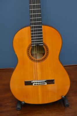 Lot 1048 - YAMAHA; a CG-130 Classic guitar, together with...
