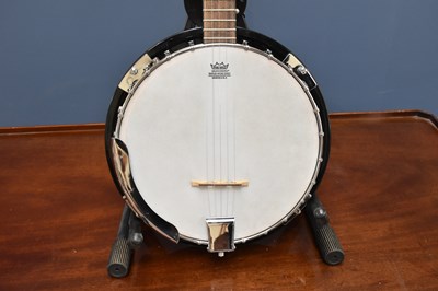 Lot 1042 - COUNTRYMAN; a five string banjo, together with...