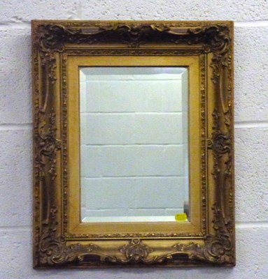 Lot 52 - A modern rectangular bevel edge wall mirror