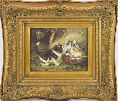 Lot 699 - A decorative picture depicting three cats, in...
