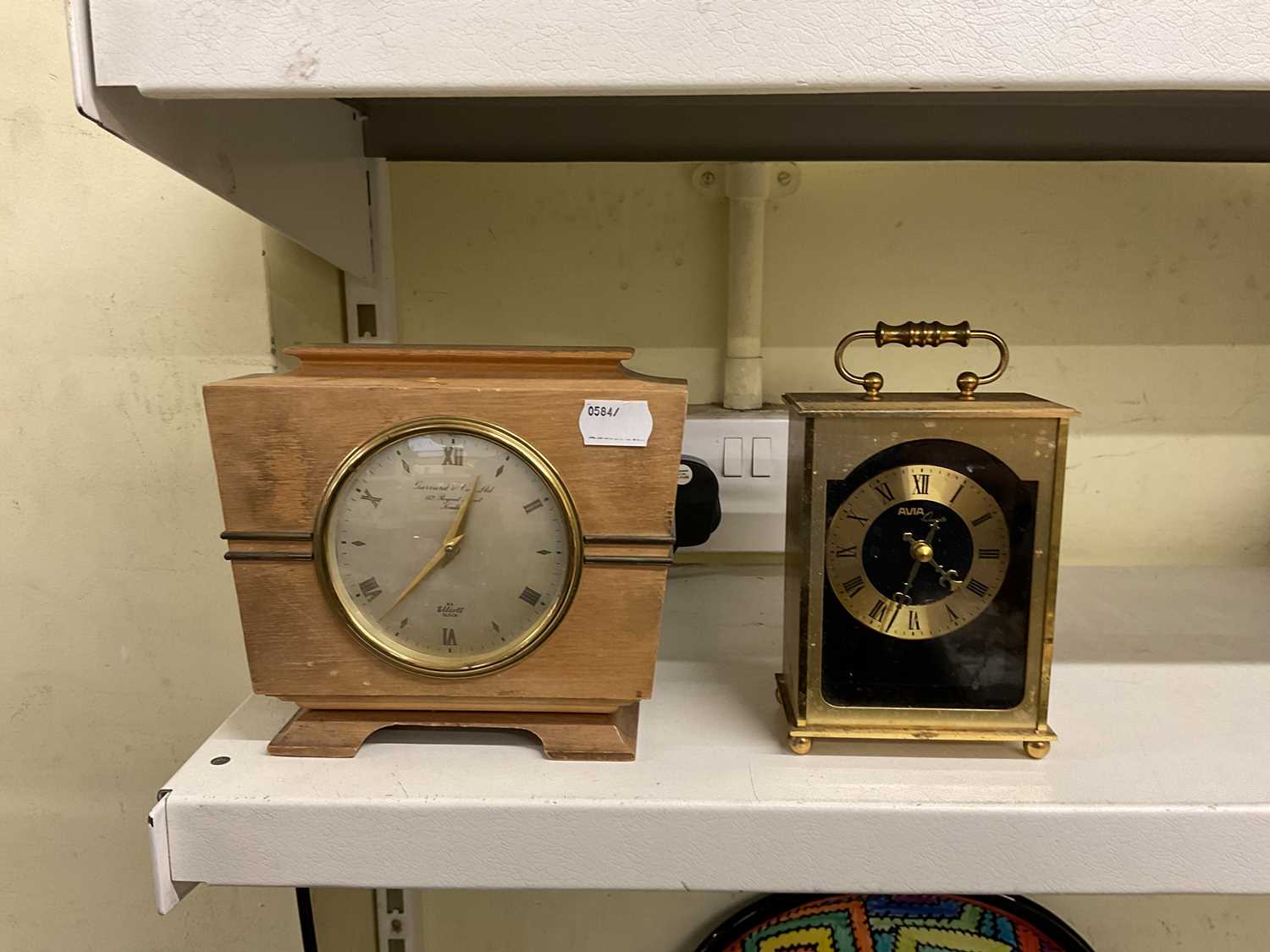 Lot 206 - An Elliott clock retailed by Garard & Co,...