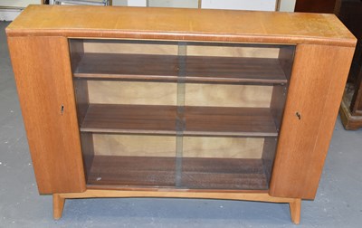 Lot 83 - A mid-20th century teak display cabinet with...