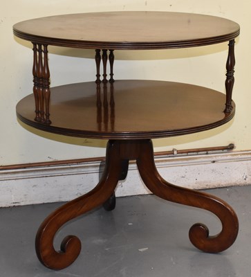 Lot 86 - A reproduction mahogany two tier occasional...