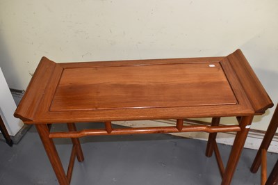 Lot 23 - Two modern Chinese hardwood alter tables,...
