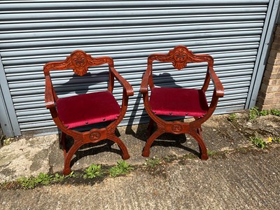 Lot 105 - A pair of reproduction Savonarola chairs.