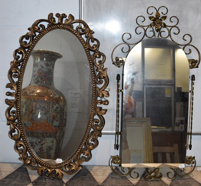 Lot 141 - A gilt framed oval wall mirror, 72 x 45cm, and...