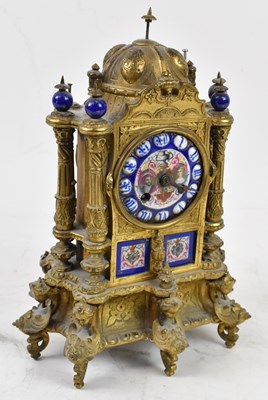 Lot 191 - A 19th century French gilt metal and porcelain...