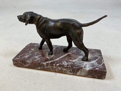 Lot 212 - A spelter Art Deco hunting dog on marble plinth