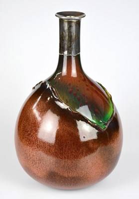 Lot 227 - BRETBY; a large bottle vase with white metal...