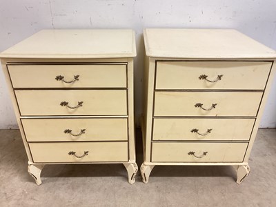 Lot 748 - A pair of modern cream painted four drawer...