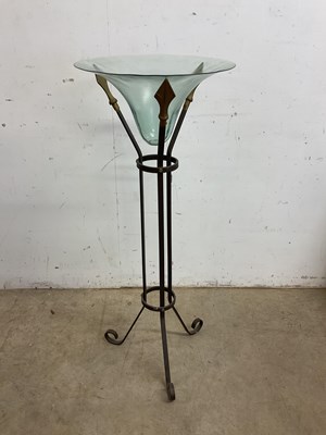Lot 753 - A wrought iron stand with conical glass...